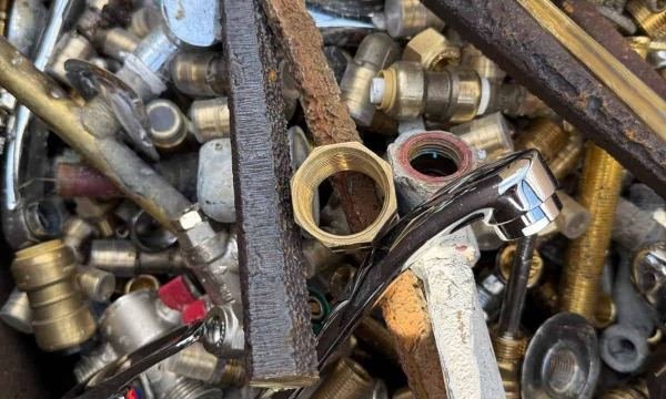 WhatsApp Image 2026-03-30 at 12.00.31 PM (2) Brass taps, valves and fittings sorted for recycling