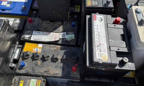 Pallet of used lead-acid batteries at the Green Fields yard
