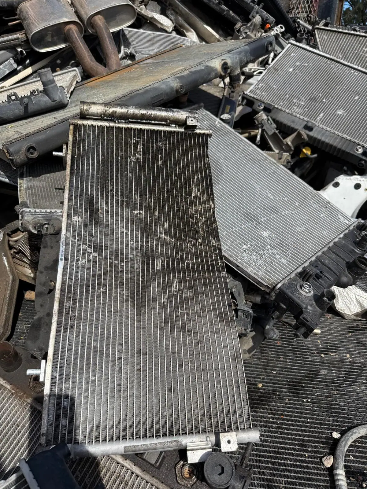 WhatsApp Image 2026-03-30 at 12.00.39 PM (1) Radiator cores and coils sorted for recycling