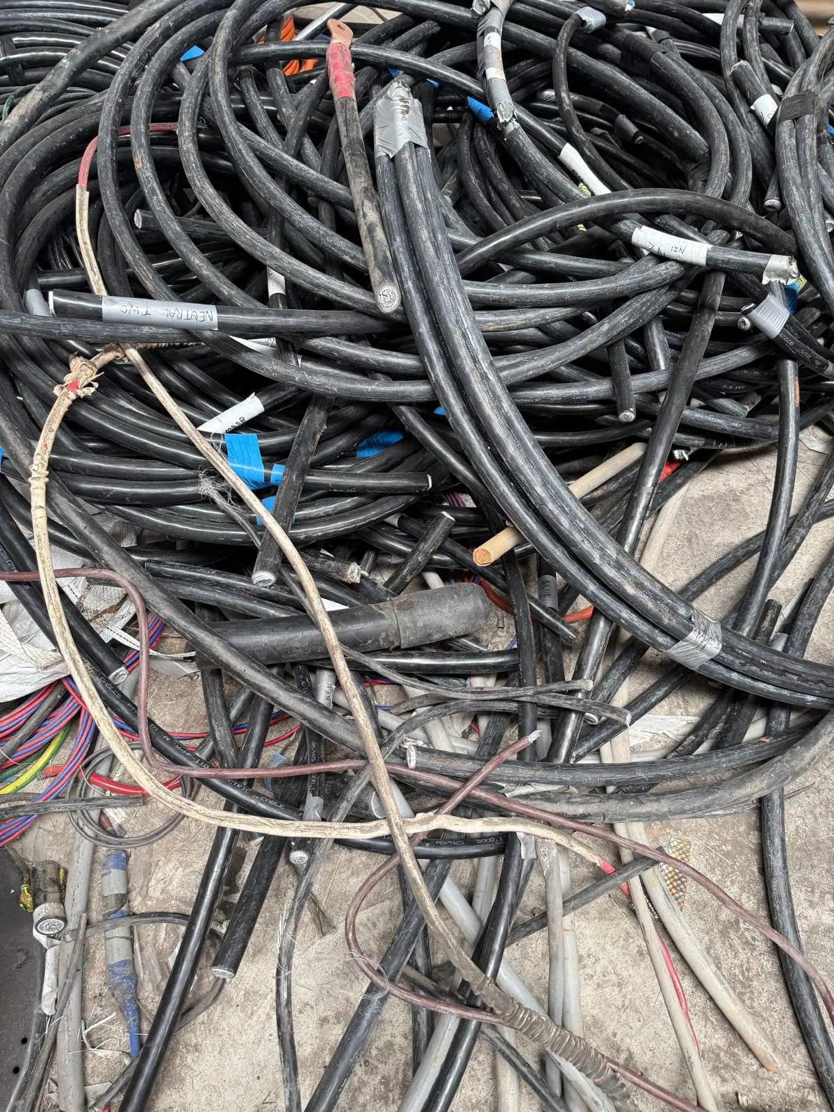 WhatsApp Image 2026-03-30 at 12.00.51 PM Heavy black power cable scrap sorted at the yard