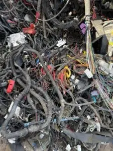 Automotive wiring looms and connectors collected for cable recycling