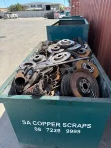 Brake discs and ferrous scrap in an SA Copper Scraps bin