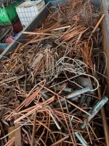 Copper pipe and tube offcuts in a scrap bin at SA Copper Scraps