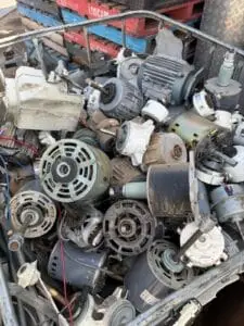 Electric and starter motors in a cage awaiting copper recovery